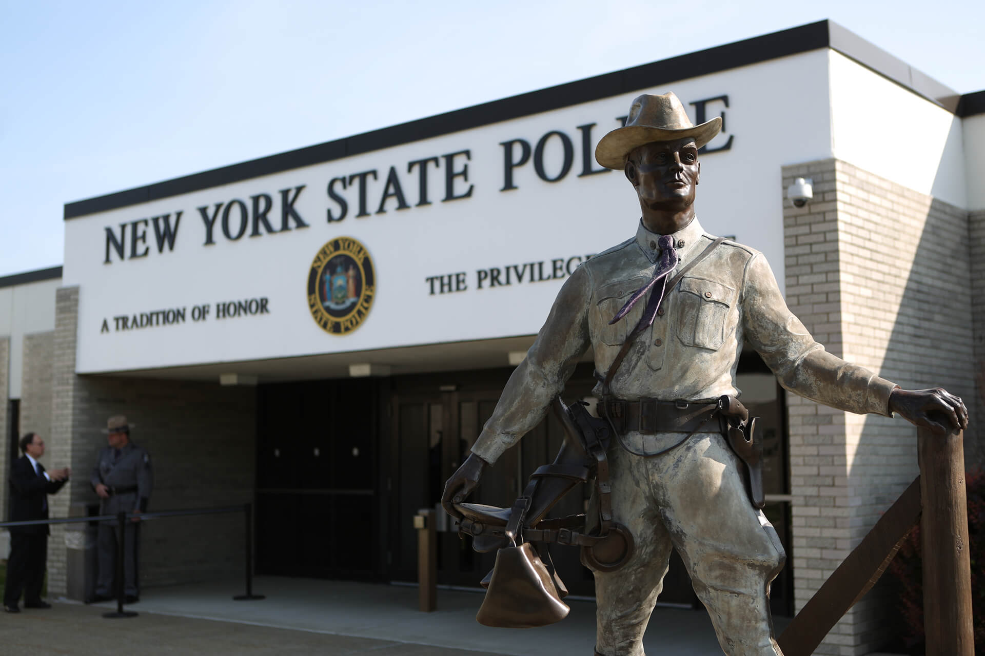 Statue of a Trooper in front of the NY State Police building entry